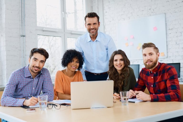 Young business people in office during company training, workshop.